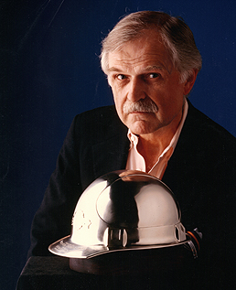 William Frederick with a sterling hardhat he created.