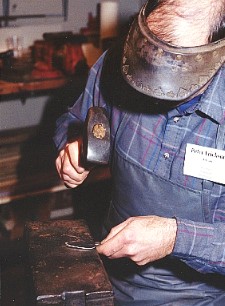 Peter Erickson giving a flatware forging demonstration
