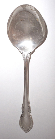 Silver spoon in need of restoration and polishing